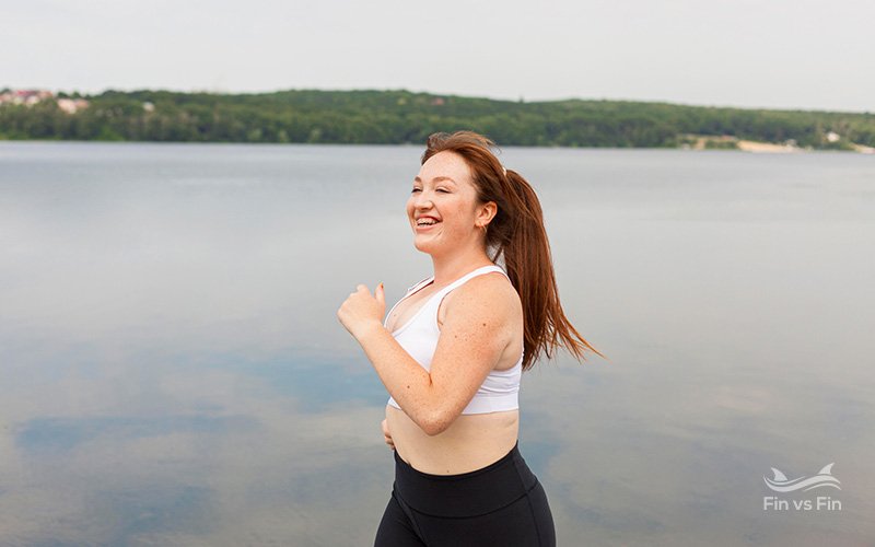 smiley woman jogging