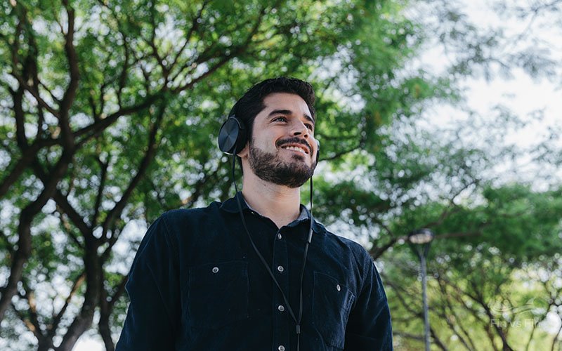 excited man listening music